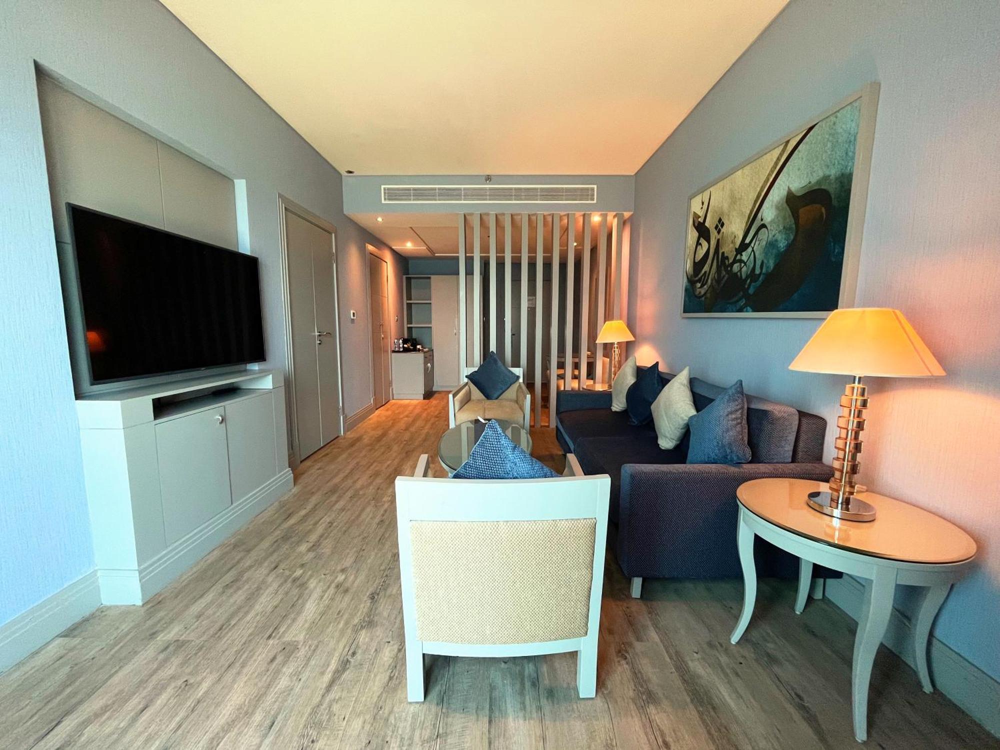 Sofitel Al Khobar The Corniche Hotel Exterior photo A living room in a suite at the hotel